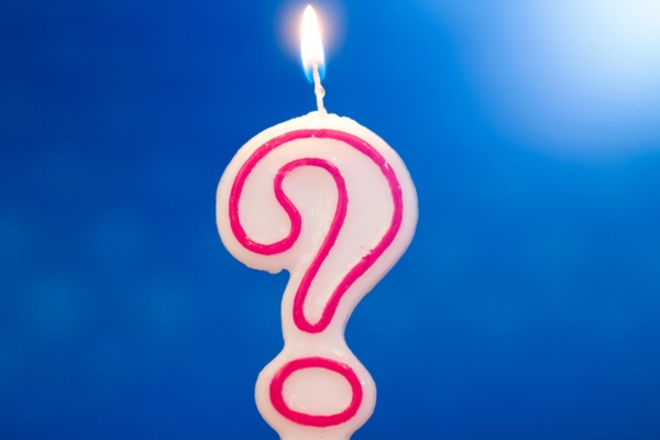 lit up candle question mark depicting FAQs about Commercial Propane Backup Generators