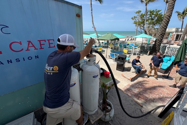 deBoer Propane staff refilling propane tank
