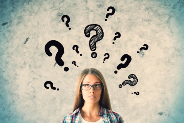 woman looking up surrounded by doodles of question marks depicting Propane Myths FAQs