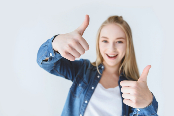 young girl doing a thumbs up depicting Propane Appliances Deliver Better Efficiency