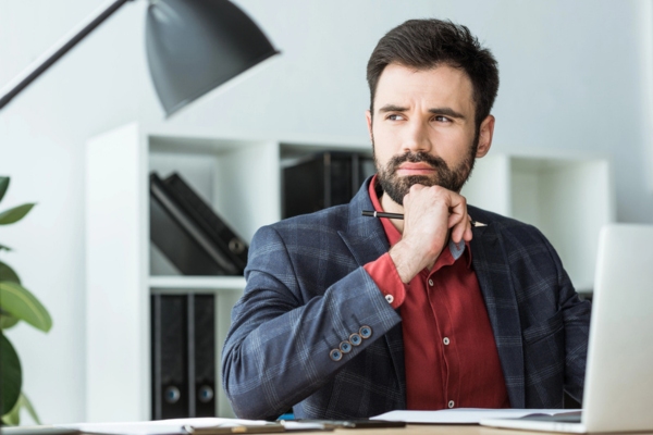 businessman thinking depicting Selecting the Right Energy Option for Your Business