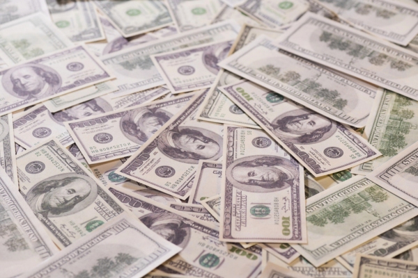 dollar bills on the table