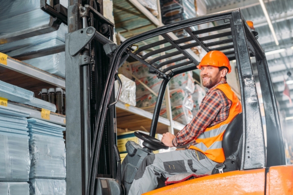 man operating a forklift
