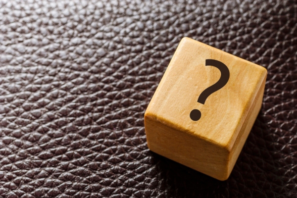 question mark on a wooden cube depicting How To Tell If Home Propane Tank Is Empty FAQs