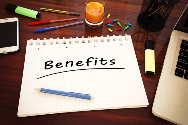 Benefits word handwritten in a notebook