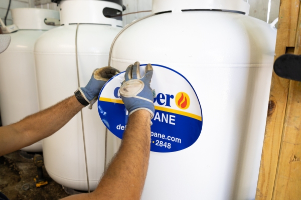 deBoer Propane tanks being labeled