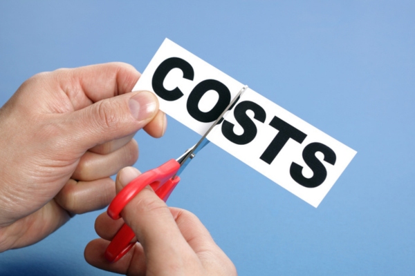 cutting paper with word costs depicting Propane Can Help Cut Maintenance Costs